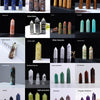 A collection of natural crystal point prisms and towers in various colors like pink, green, blue, and purple.