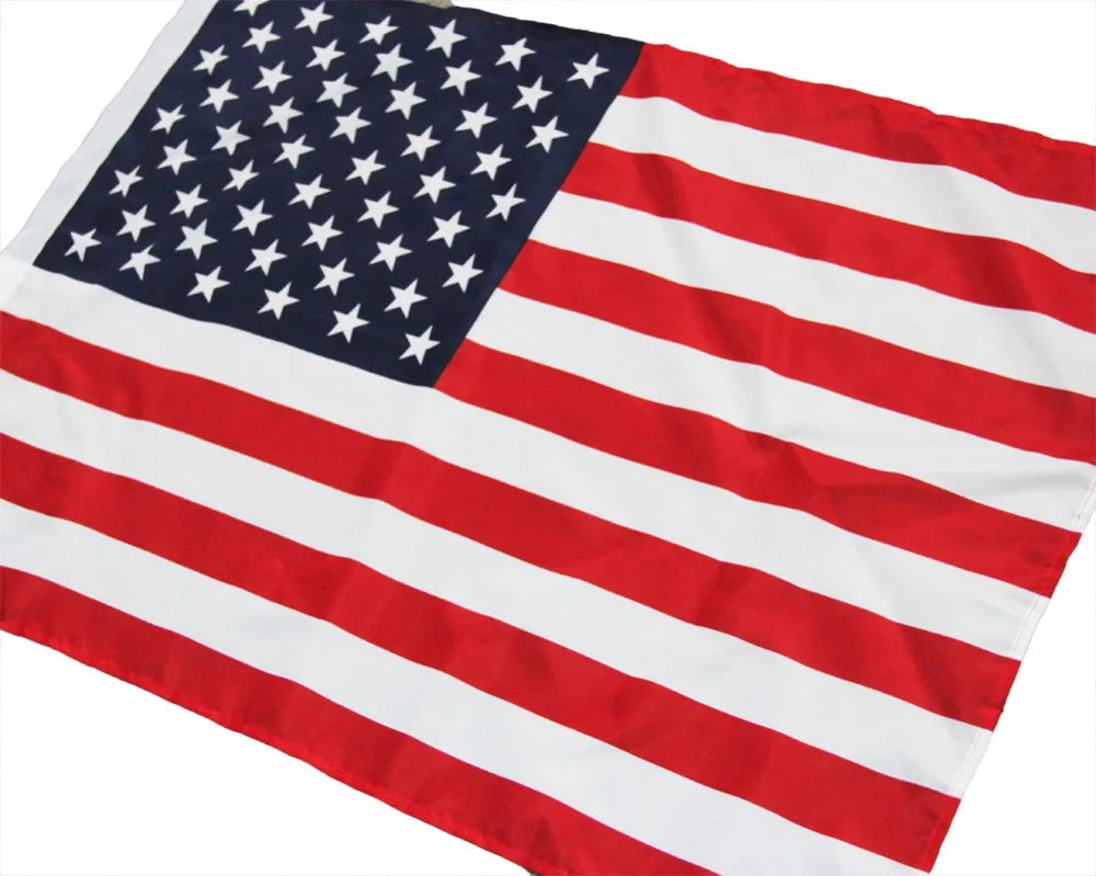 A large American flag banner featuring the stars and stripes design.