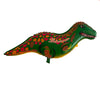 A green dinosaur foil balloon decoration featuring orange and red patterns.
