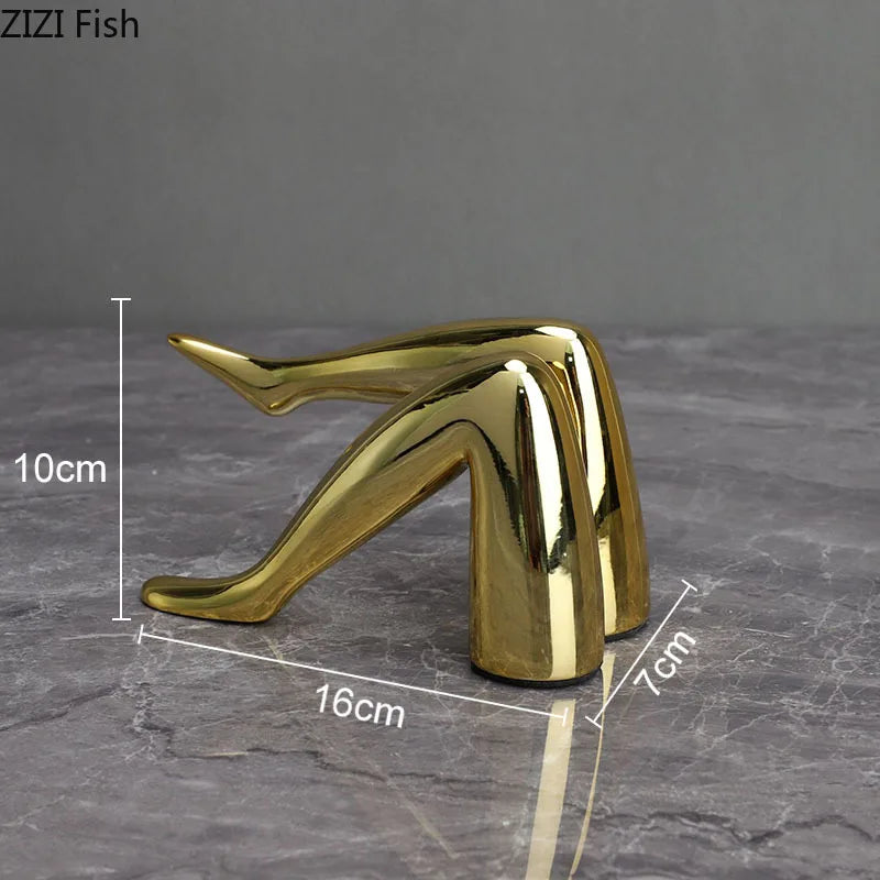 Gold faux finish human body resin art sculpture shaped like a leg