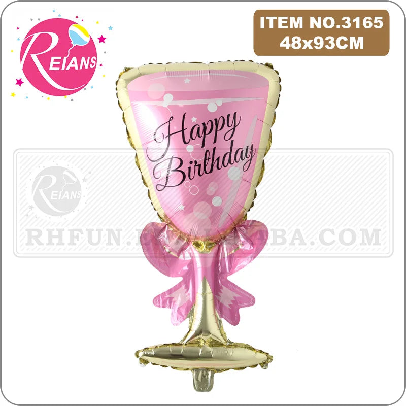 A pink and gold foil balloon shaped like a champagne bottle with a birthday message