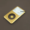 Plaque dorée pour kit de réparation d'iPod Classic avec un trou circulaire.