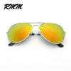 A pair of classic pilot sunglasses with mirrored yellow-orange lenses and silver frames.