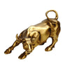 A brass sculpture of a bull head with horns and a curved handle, used for home decor.