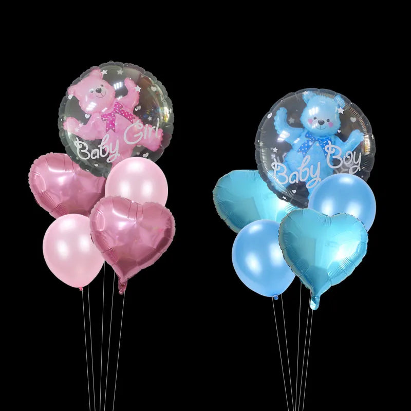 A bundle of clear and pink heart-shaped balloons featuring bear and baby designs for parties