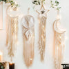 Boho macrame dream catcher wall decor featuring multiple hanging macrame pieces in neutral tones.