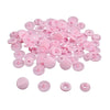 A pile of assorted pink snap buttons, measuring 12mm and 10.5mm, for crafting.