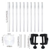 A set of clear plastic balloon arch column stands and black clip holders for display.