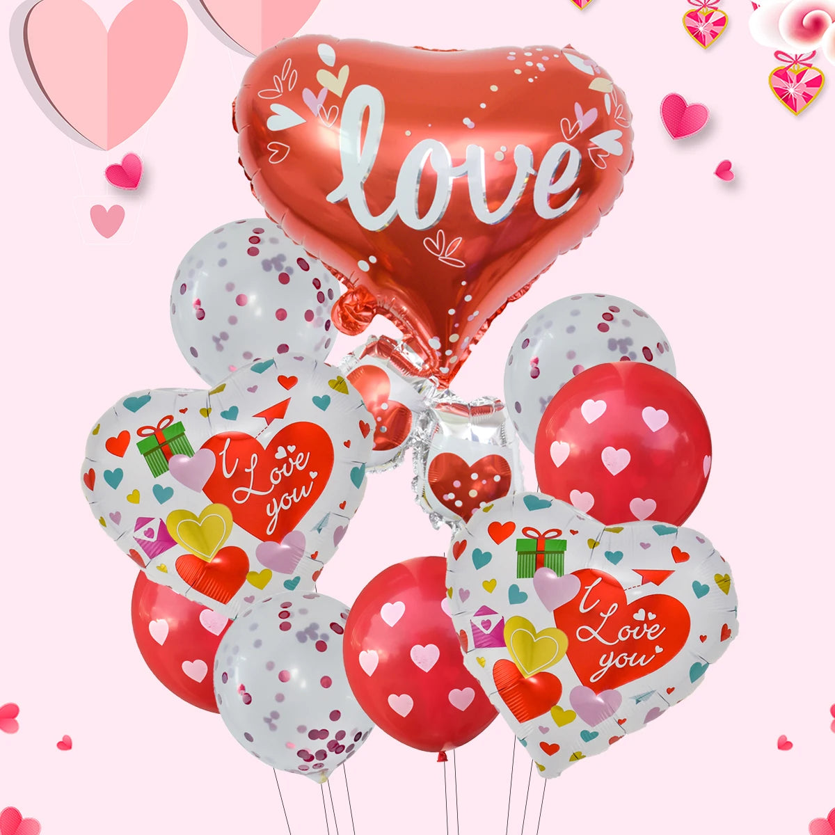 A bouquet of ten heart-shaped foil balloons in pink, red, and white with 'I love you' designs.