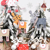 Hand-painted wooden deer ornaments in various colors and patterns decorating a festive Christmas tree.