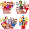 A hand holds a set of plush finger puppets featuring family animals and dolls for storytelling.
