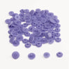A pile of assorted purple snap buttons, measuring 12mm and 10.5mm, for crafting.