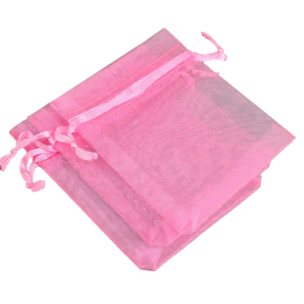 Pink organza drawstring gift pouch for jewelry, candy, or party favors