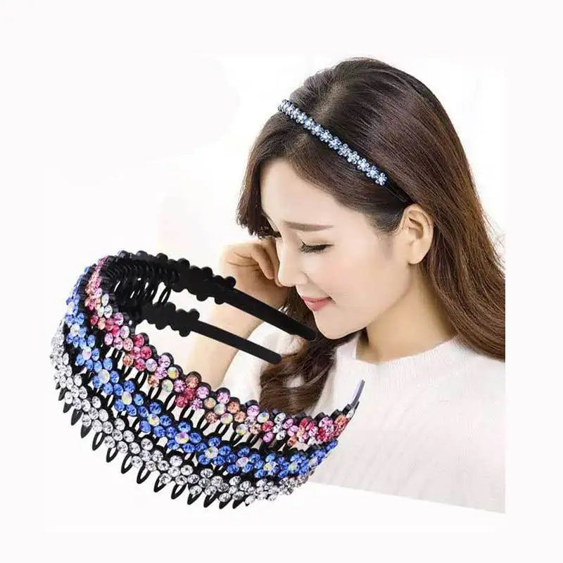 A woman is wearing a black crystal rhinestone headband on her hair.