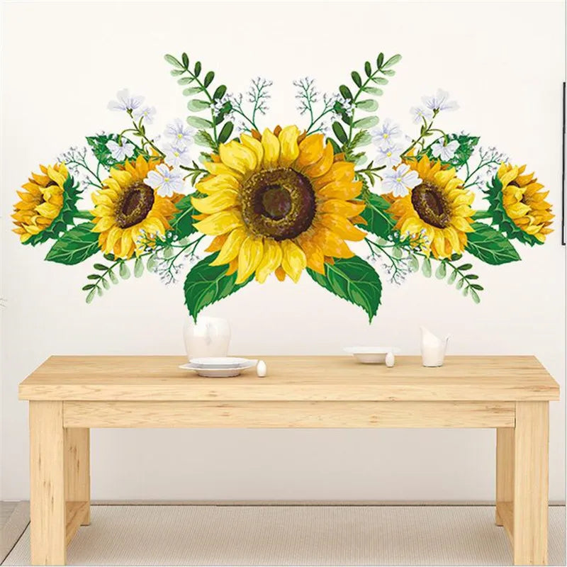 A floral wall decal featuring yellow sunflowers and green foliage on a white background.