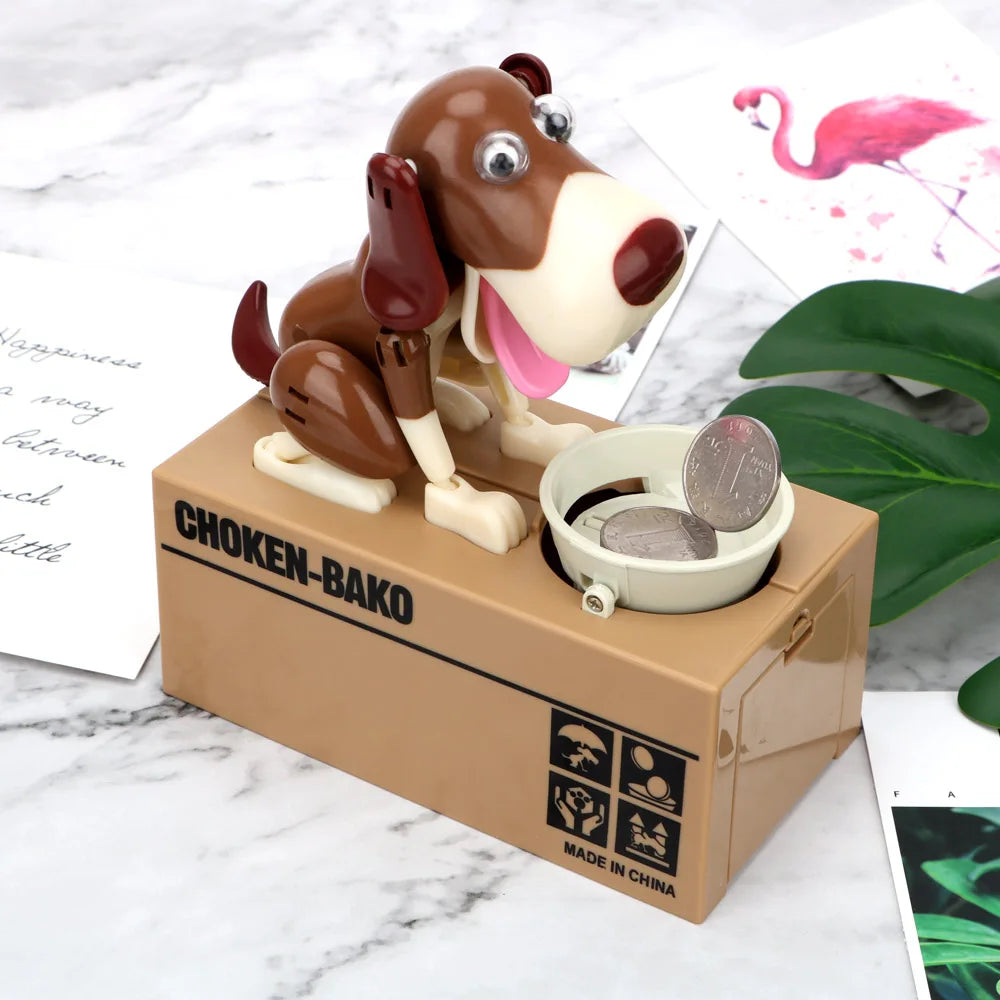 A small robotic dog figurine in brown and white is placed on a cardboard box labeled CHOKEN-BAKO.