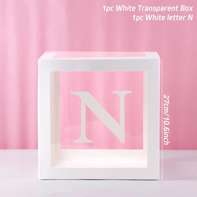 A white transparent box with a large white letter N inside, displayed against a pink background.