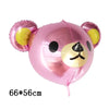 Globo de papel de aluminio rosa con forma de cara de oso y detalles amarillos