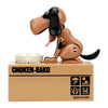 A brown robotic dog figurine, the Choken-Bako, sits on a cardboard box labeled Made in China.