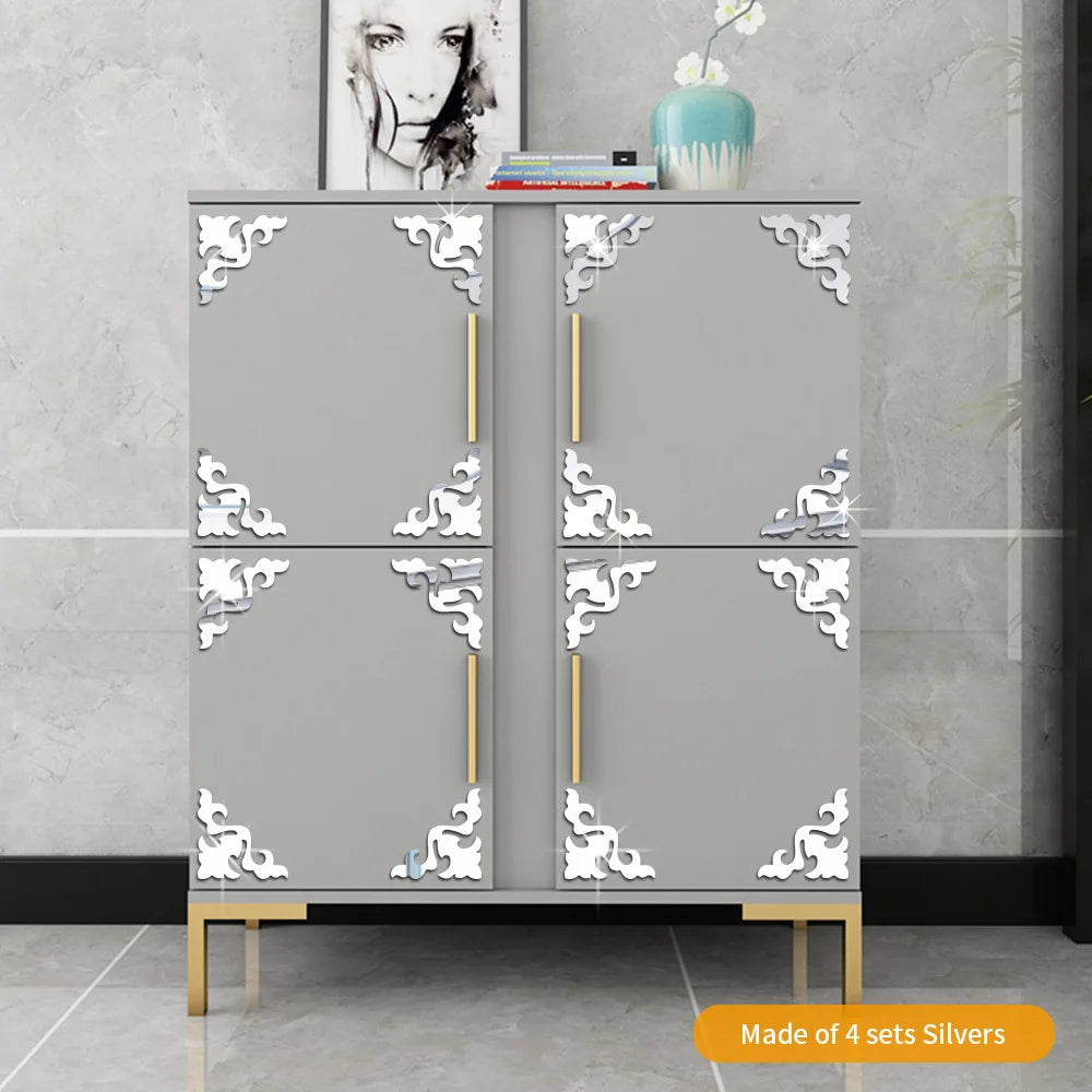 A gray cabinet with decorative white floral accents and gold trim, used as a wall sticker for home decor.