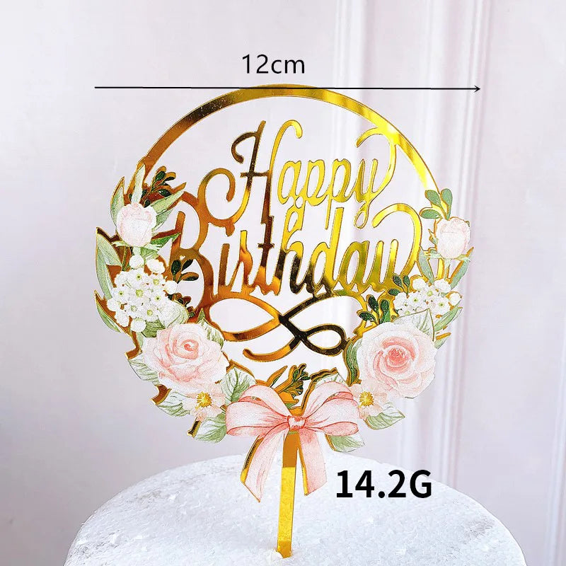 Rose gold acrylic happy birthday cake topper featuring a floral wreath design