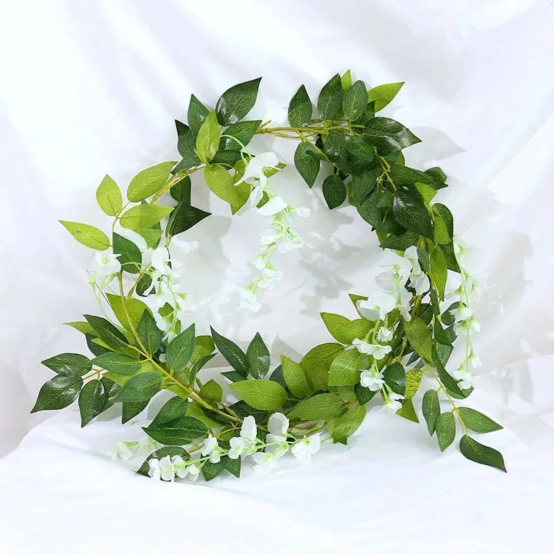 Green and white silk wisteria garland vine for weddings and home decor