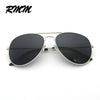A pair of classic pilot sunglasses with black mirror lenses and silver frames.