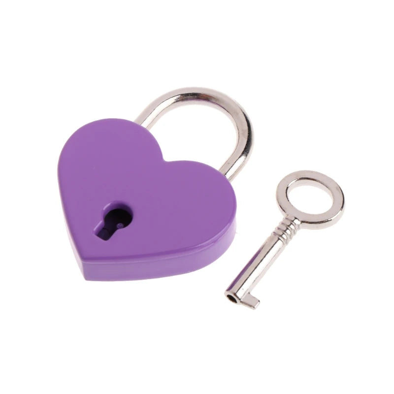 Vintage heart-shaped mini padlock and key in purple