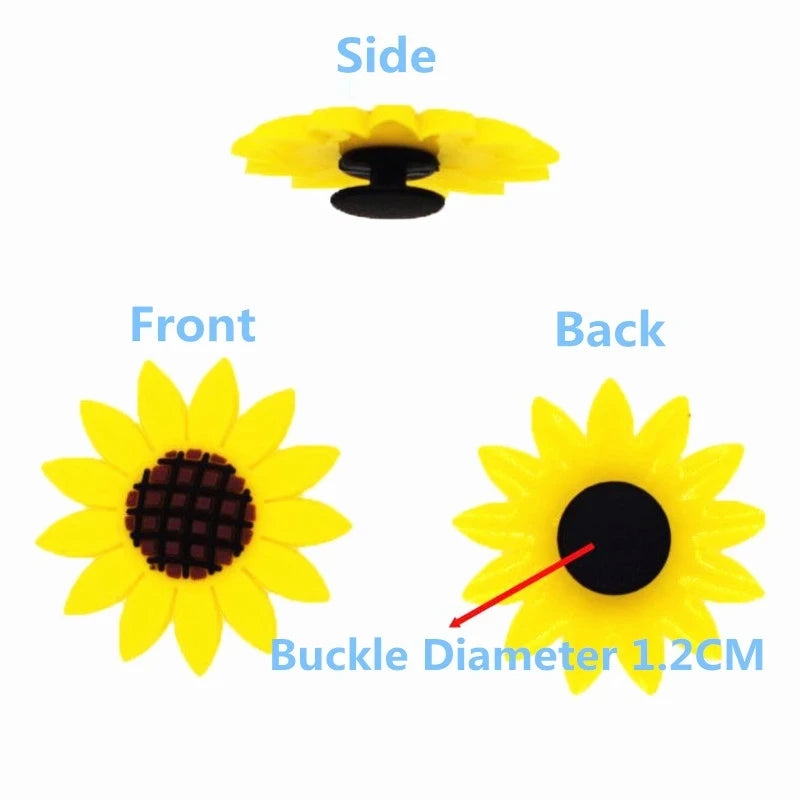 Three views of a yellow cartoon dinosaur PVC shoe charm showing the side, front, and back.