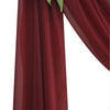 A close-up of a deep burgundy chiffon fabric used for an elegant wedding arch drape.