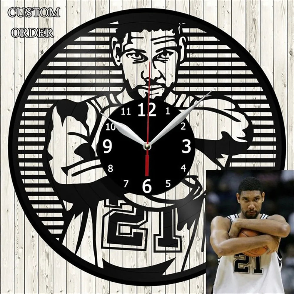 Black wall clock featuring a stylized deer head design with Roman numerals and a basketball player silhouette.