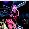 A person dressed as a bloody, monstrous figure hangs from wires in a dark, spooky environment.