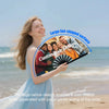 A woman holds a large fan-shaped surface design featuring smiling people and text, demonstrating the product's features.