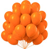 A bunch of bright orange latex balloons tied together for party decoration.
