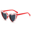 Red frame pearl-embellished heart-shaped sunglasses for brides