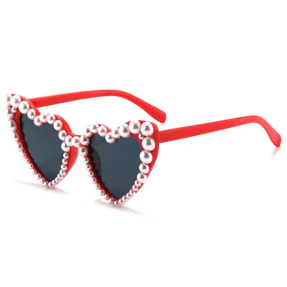 Red frame pearl-embellished heart-shaped sunglasses for brides