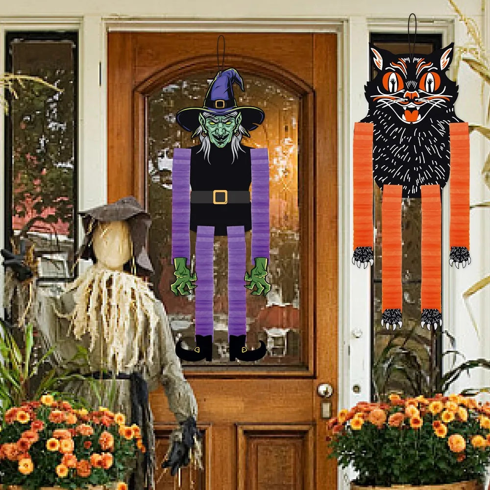 A set of Halloween hanging ornaments featuring ghosts, pumpkins, and skeletons displayed in a wooden frame.
