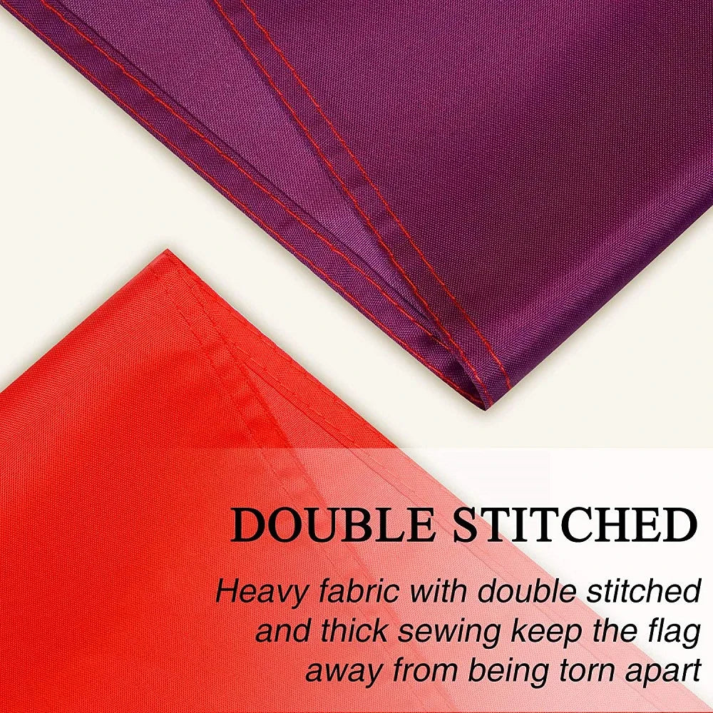 Close-up of a purple and red fabric flag with double stitched heavy sewing to prevent tearing.