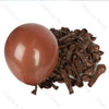 A brown latex balloon next to a pile of dark brown, elongated, foil-wrapped candies.