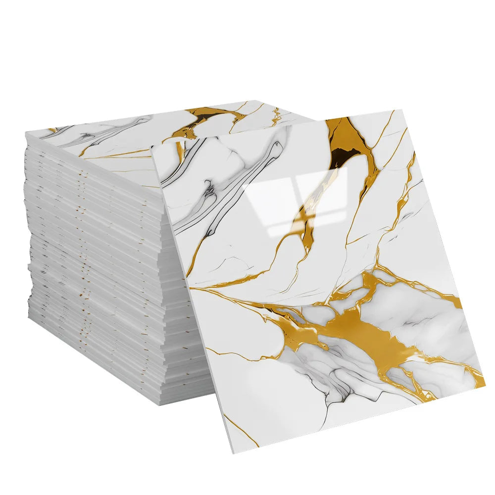 A stack of marble peel-and-stick tile stickers featuring white marble with gold accents.