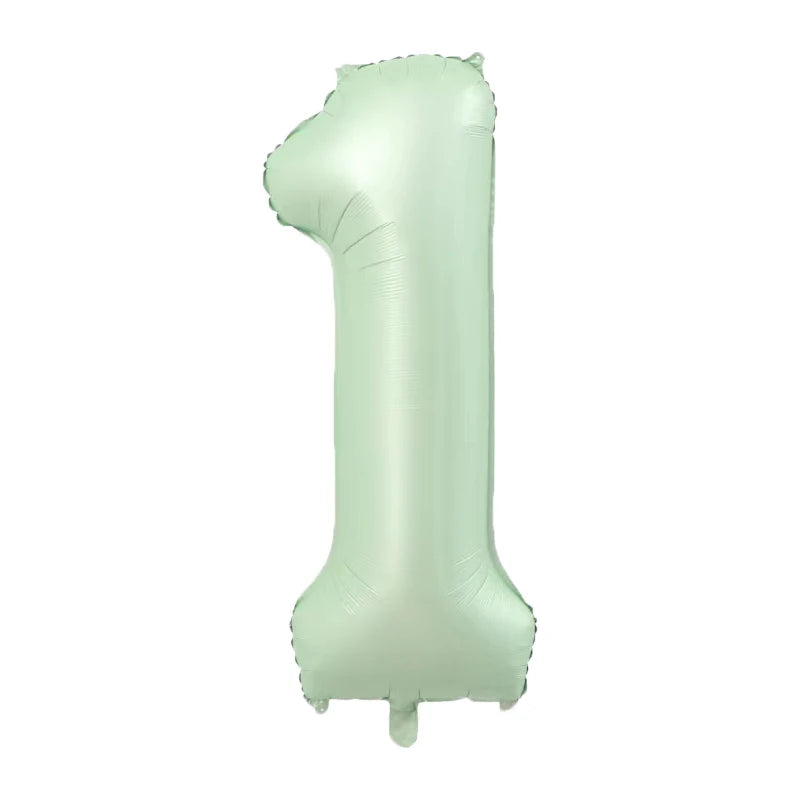 A large, light mint green foil number balloon shaped like the number 1.