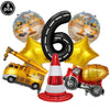 Eight construction truck foil balloons and a red and white traffic cone for birthday party decor