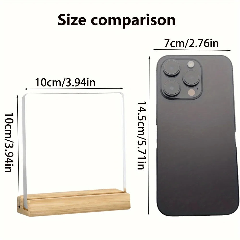 Size comparison showing an inspirational acrylic desktop sign next to a smartphone.
