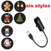 Six styles of Halloween ghost and skull projector night lights shown with a power cord.