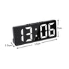 A black LED digital alarm clock displaying 13:06 with dimensions shown.