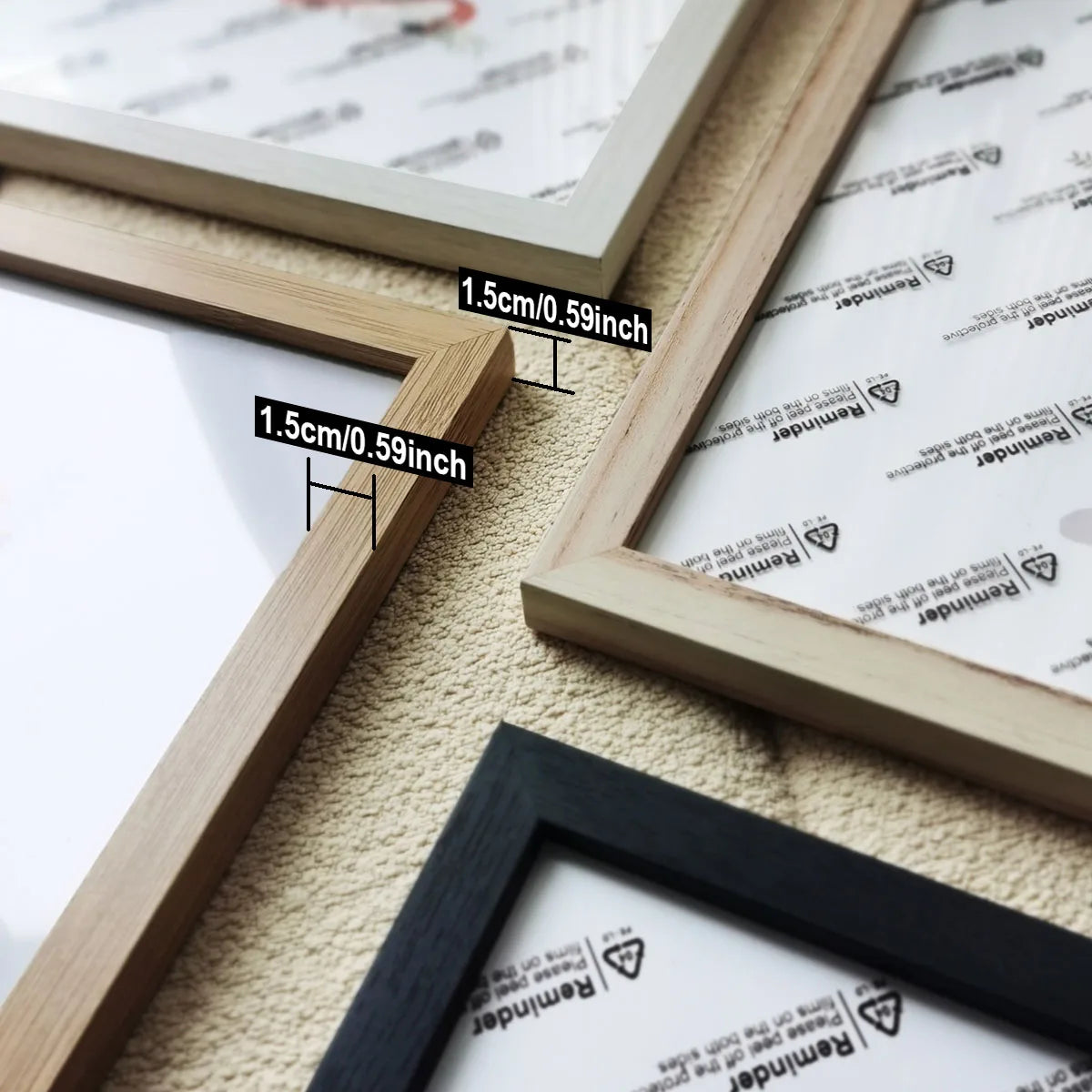 Close-up of wooden photo frames showing measurements and various wood tones for wall decor.