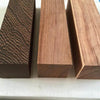 Three rectangular blocks of natural wood with distinct grain patterns for knife handles and DIY projects