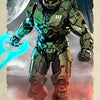 A depiction of Master Chief in green armor against a backdrop of a large moon and fiery orange ground.