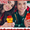 Two people smiling while holding red candy jars with lids in a festive Christmas setting.