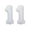 Two white helium foil number balloons shaped like the number 1